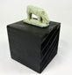 Ancient Egypt shrew-mouse amulet, pale green faience with mineral accretions, votive temple offering.