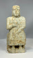 Early Dynastic carved stone votive figure from Mesopotamia