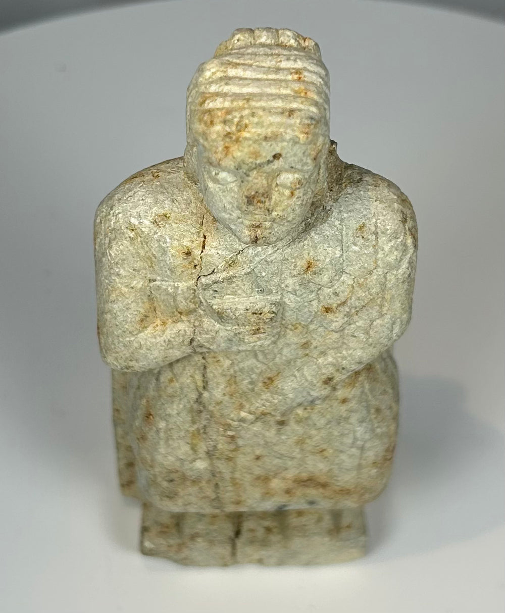 Standing Near Eastern worshipper sculpture with stylized features