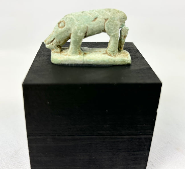 Egyptian faience shrew figurine, Late Period–Ptolemaic, mounted on modern black display block.