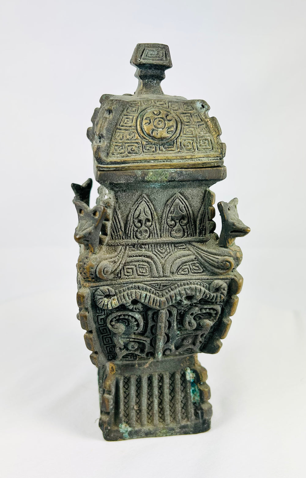 Cast bronze fang yi vessel in Shang/Zhou style, pedestal base and domed lid, Qing to early Republic period.