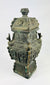 Archaistic Chinese ritual bronze with kui dragons and leiwen scrollwork, square form with stepped knop lid.