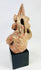 West Mexican shaft-tomb figure showing ritual pose and conical headgear
