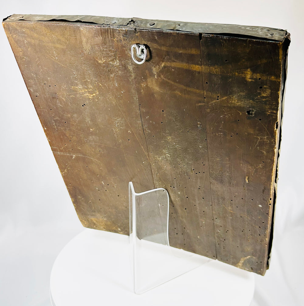 Religious icon with metal oklad featuring saints, Trinity, and biblical scenes