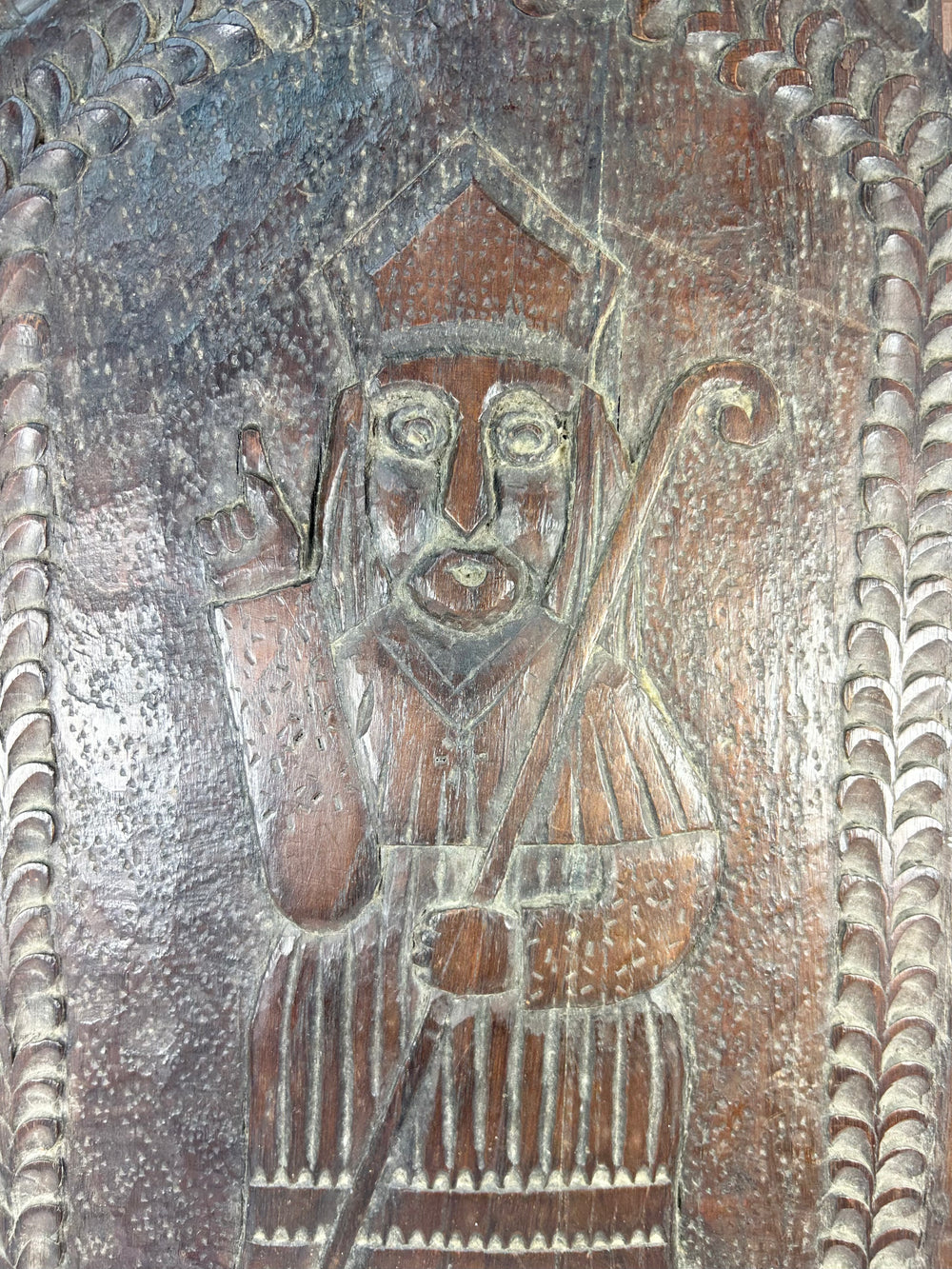 Naïve devotional wood panel of Saint Nicholas or bishop saint, walnut or fruitwood, early 19th century