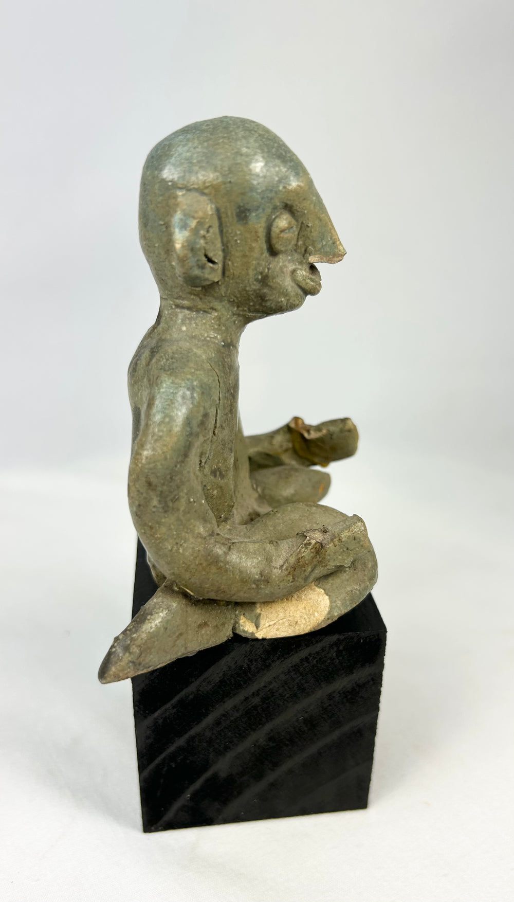 Pre-Columbian terracotta funerary figure from Nayarit region mounted on stand