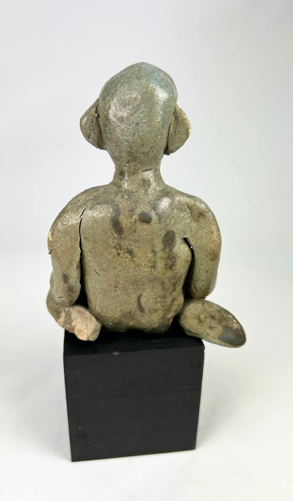 Ancient West Mexico shaft-tomb terracotta figure with mineral accretions and age wear