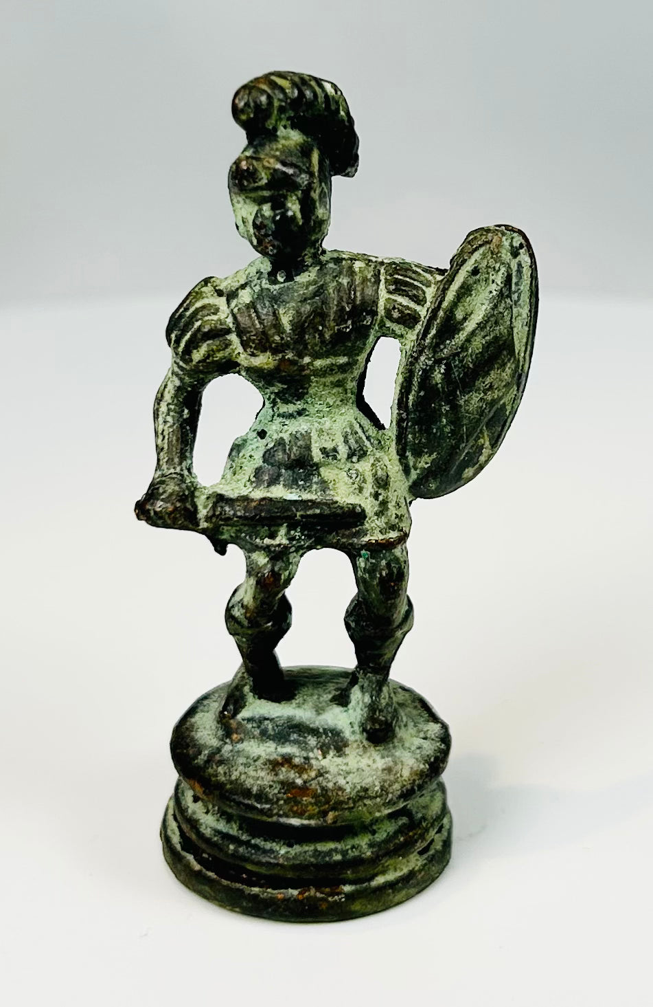 Neoclassical bronze statue of Greek hoplite warrior with aged green patina