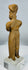 West Mexico terracotta fertility figure with warm earthen patina and expressive stylized features.