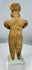 Pre-Columbian West Mexican terracotta female effigy with prominent ear ornaments and stylized facial features.