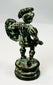 Antique bronze soldier figure with round shield and short tunic