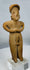 Authentic Pre-Columbian female figure from the Colima culture featuring a circular coiffure and earspools.