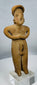 Authentic Pre-Columbian female figure from the Colima culture featuring a circular coiffure and earspools.