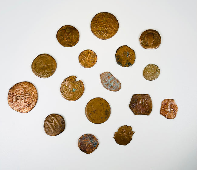 Group of excavated Roman Byzantine coins with green and brown burial patina