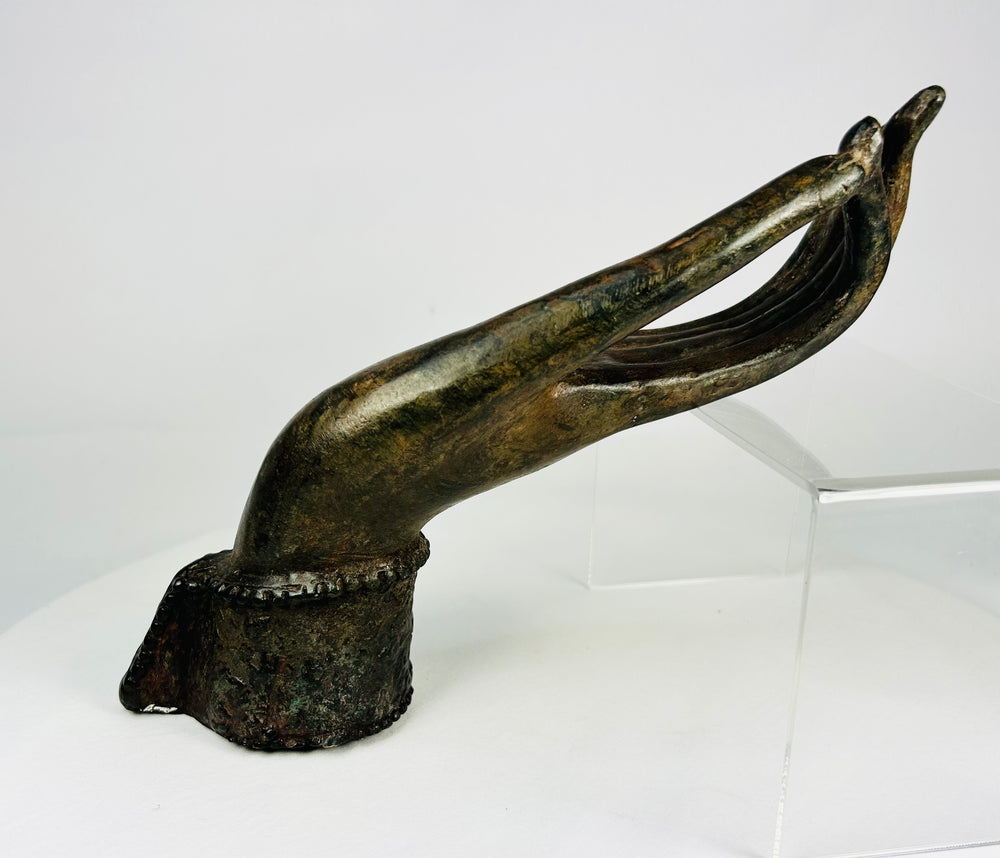 Southeast Asian Buddhist bronze hand, Vitarka mudra form, deep olive patina and earthen accretions.