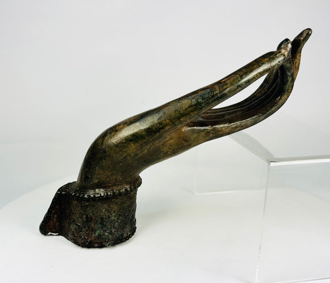 Southeast Asian Buddhist bronze hand, Vitarka mudra form, deep olive patina and earthen accretions.