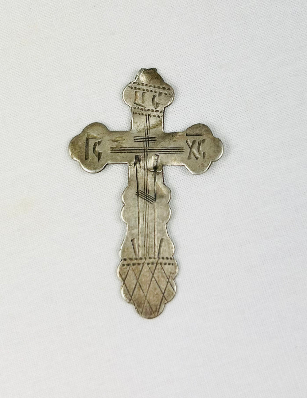 19th century Russian Empire Orthodox devotional pendant cross in .875 silver with Golgotha skull base and original 84 hallmark on reverse.