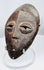 African tribal Lega mask associated with the Bwami initiatory society and personal status symbolism.