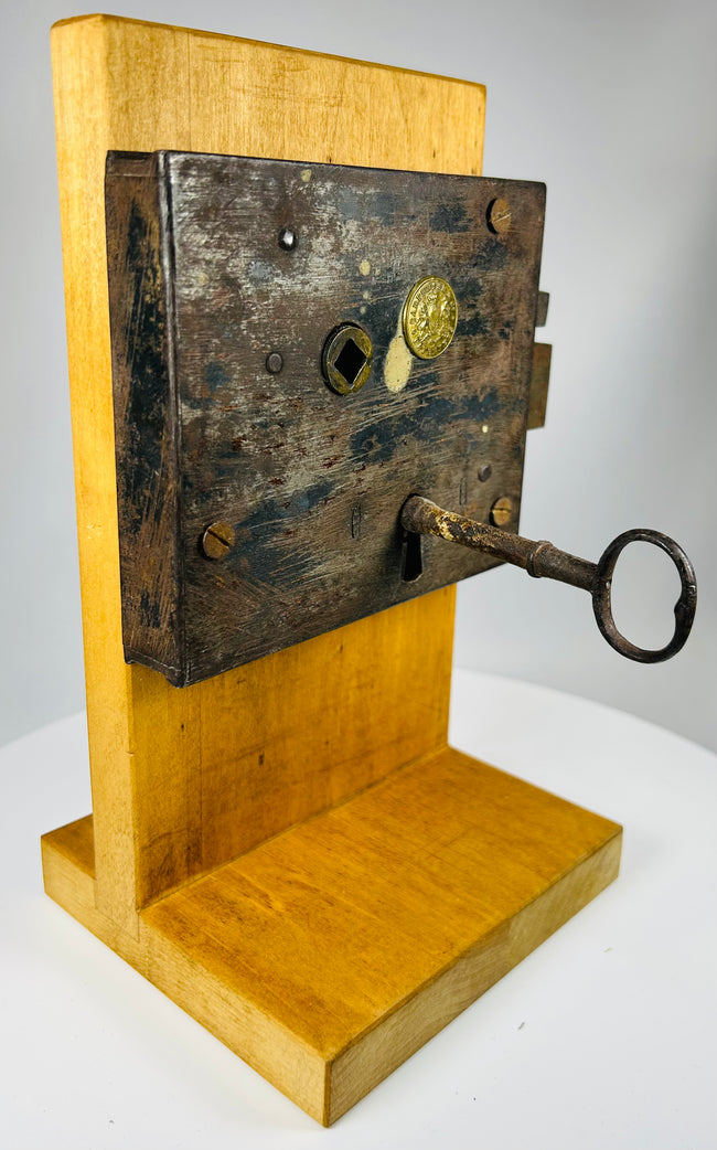 Vintage Carpenter and Co door lock with sliding bolt and original key