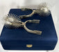 Vintage equestrian spurs from Chile with ornate metalwork and patina