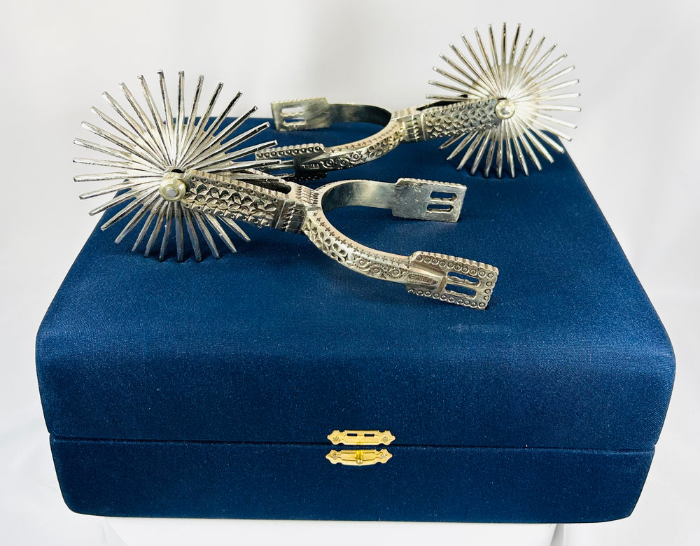 Pair of Chilean espuelas with traditional design and detailed craftsmanship
