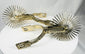 Huaso spurs from Chile with decorative engraving and multi-point star rowels