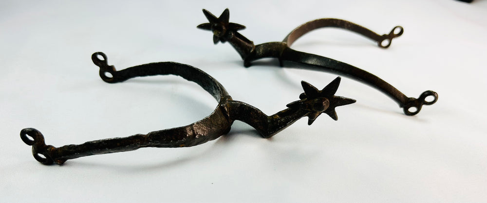Historic iron horseback riding spurs from Saxony with aged patina