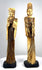 Chinese Emperor figurine with geometric headdress patterns, decorative shoulder ornaments, and deeply incised folds along its dark-stained robe.