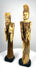 Chinese carved-bone Empress featuring an ornate feather-like headdress, delicately modelled facial features, and intricate ornamental details across her costume.