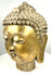Buddhist Buddha Shakyamuni head sculpture displaying a prominent urna, symmetrical facial proportions, and elongated earlobes symbolizing spiritual enlightenment.