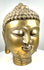 Cast copper-alloy Buddha sculpture displaying intricately modelled spiral curls, a raised ushnisha, and traditional Buddhist religious iconography.