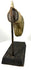 19th-century bronze Buddhist sculpture featuring intricate floral decoration, a pointed ornamental wrist cuff, and surviving gold-toned surface highlights.