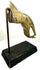 Thai Buddhist hand fragment mounted on a black rectangular display base with an upright metal support, highlighting its elegant form and sculptural detailing.