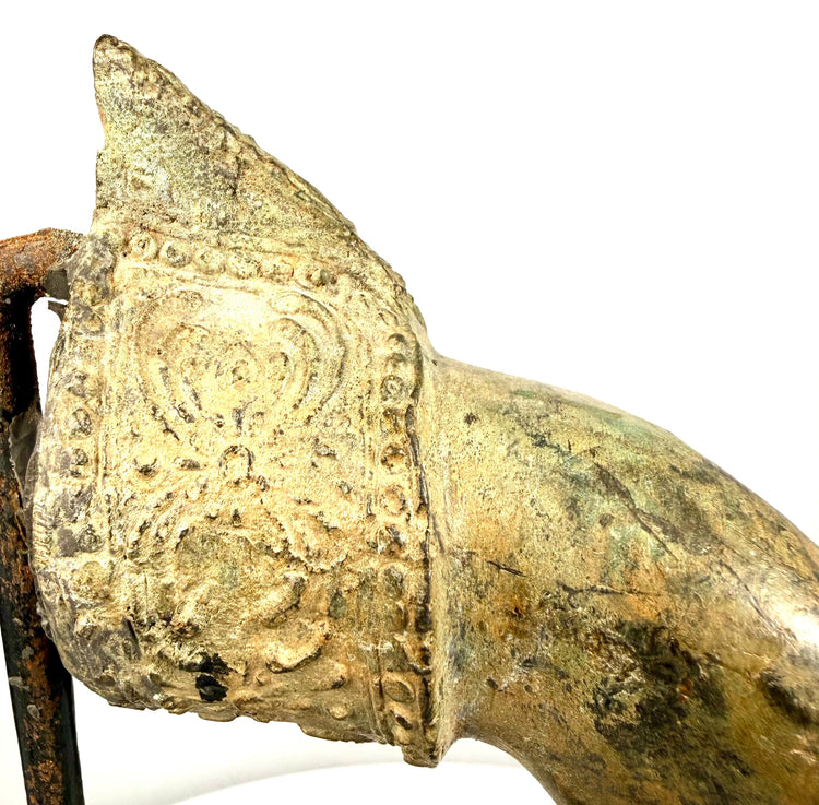 Antique Thai Buddhist hand fragment featuring an elaborate pointed wrist extension decorated with scrolling foliage, floral motifs, and raised beaded borders.