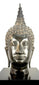 19th-century Rattanakosin period Buddha head with elongated facial proportions and traditional Thai Buddhist sculptural details.
