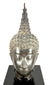 Cast copper-alloy Buddha head featuring gracefully arched eyebrows, a prominent nose, and delicately sculpted facial contours.