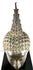 Tall flame finial on a Thai Buddha head, decorated with flowing vertical ridges symbolizing spiritual enlightenment.