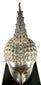 Tall flame finial on a Thai Buddha head, decorated with flowing vertical ridges symbolizing spiritual enlightenment.