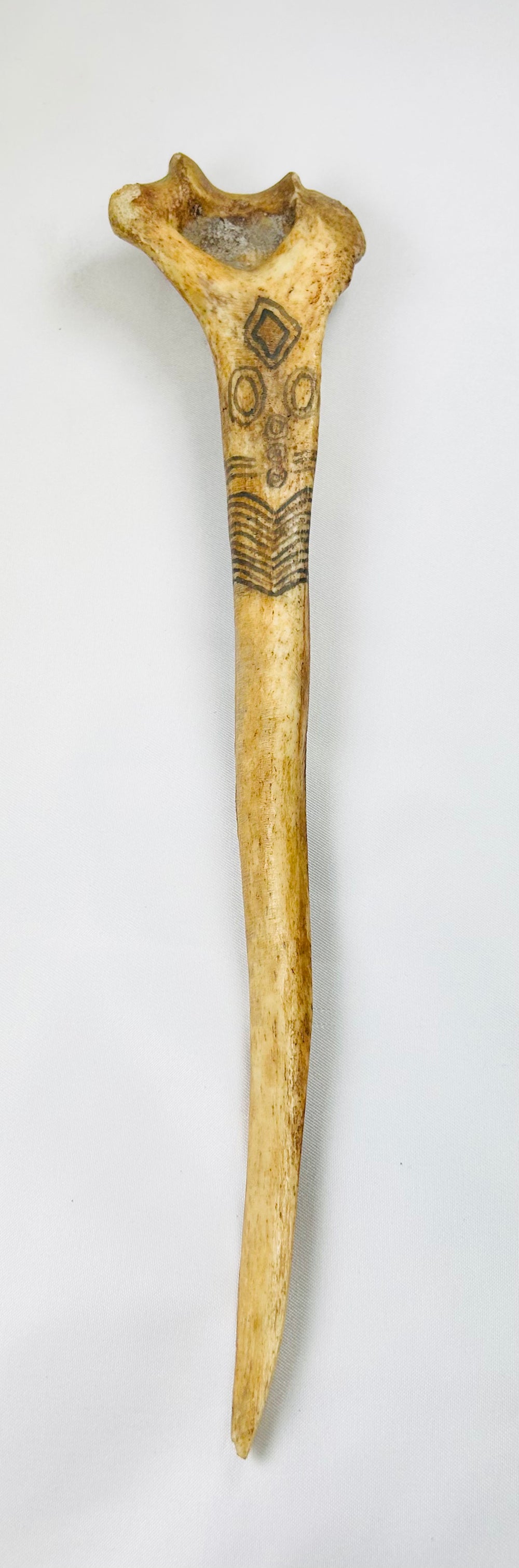 Ethnographic New Guinea Highlands dagger, human bone construction, natural pigments, 19th-century ceremonial artifact