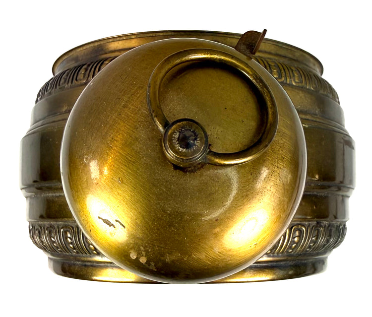 Early 20th-century German alarm clock with an aged Roman numeral dial, intricate minute markings, and two smaller subsidiary dials.