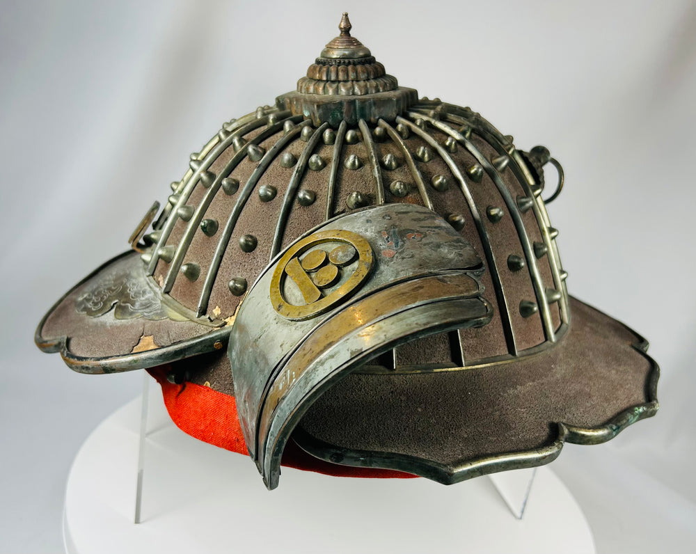 Japanese iron fire helmet with crest emblems and protective wide brim