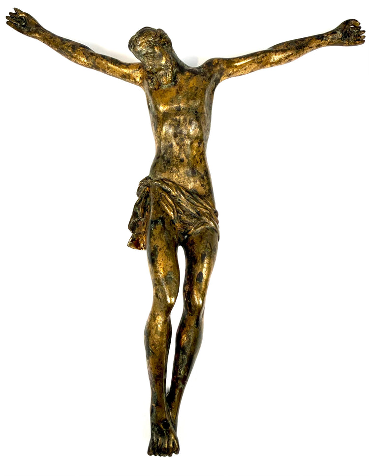 Sixteenth–seventeenth-century bronze religious sculpture with contrasting gold, dark brown, and green patination.