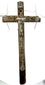 Arma Christi religious symbols arranged along the wooden cross, depicting instruments associated with the Passion of Christ.