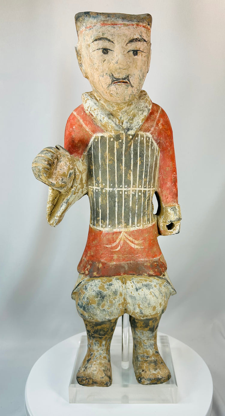 Ancient Chinese mingqi tomb figure of a standing foot soldier in painted terracotta