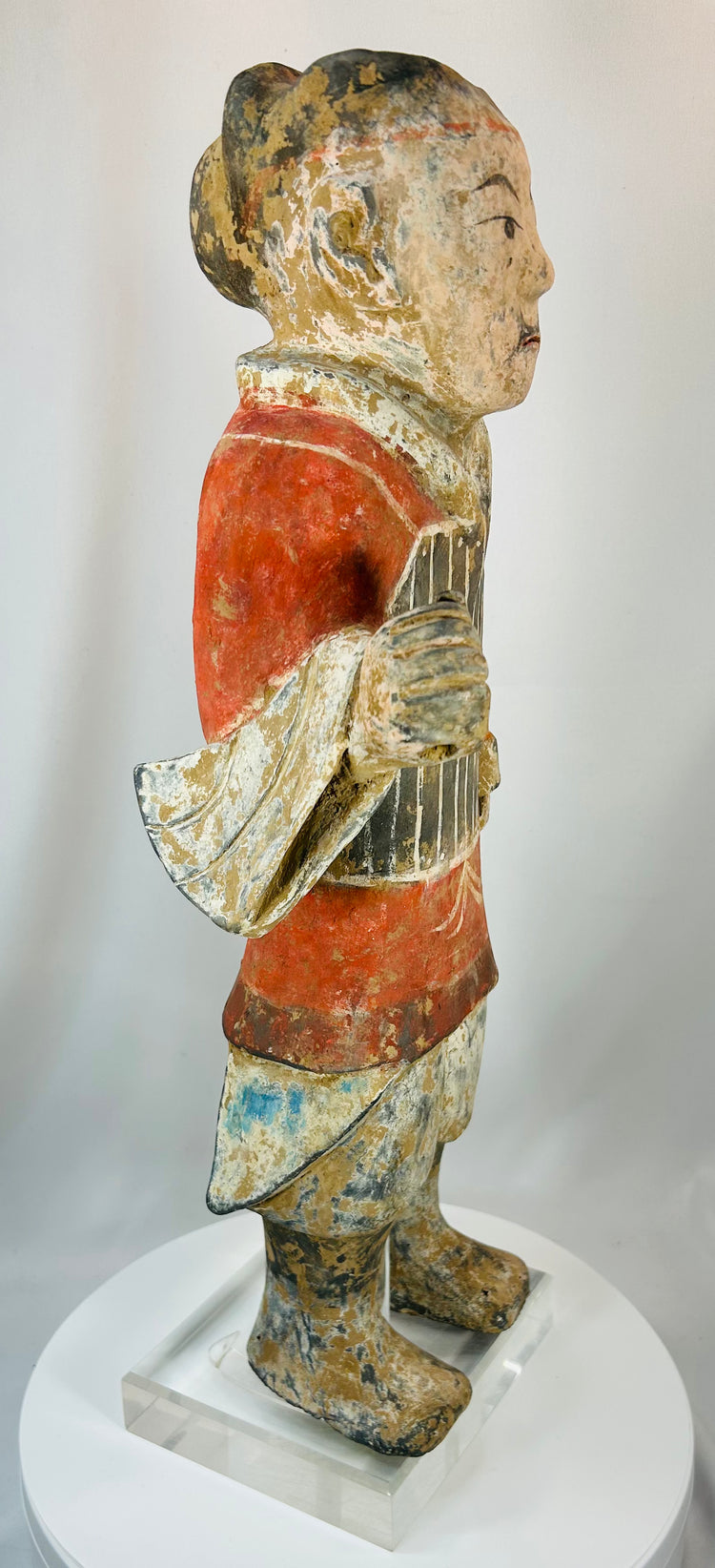 Large Han Dynasty pottery soldier with red pigment and earthen encrustation