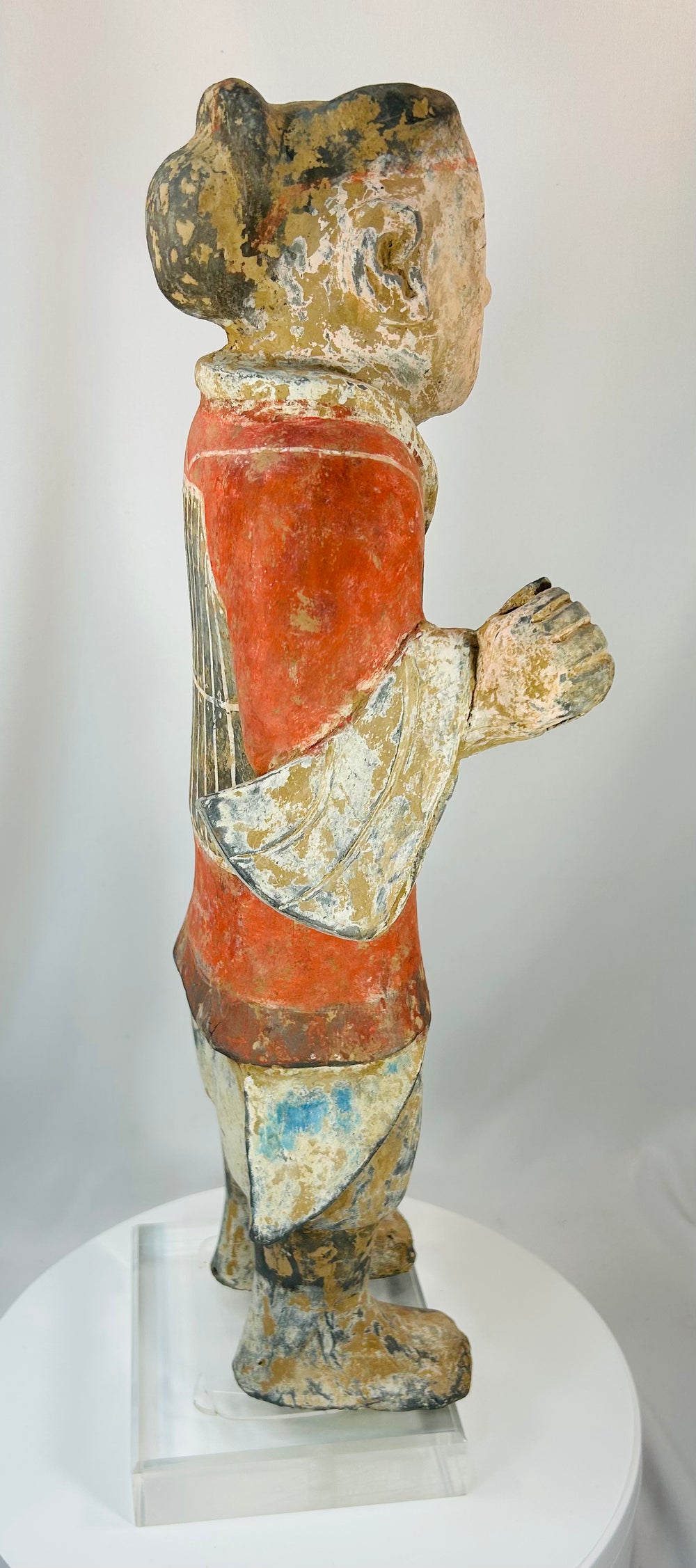 Ancient Chinese tomb figure with standing posture and burial wear