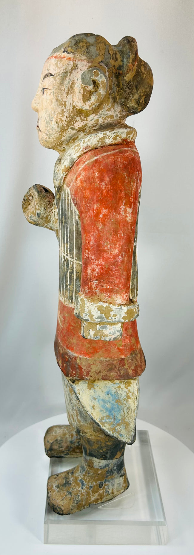 Terracotta soldier figure with natural aging and archaeological surface texture
