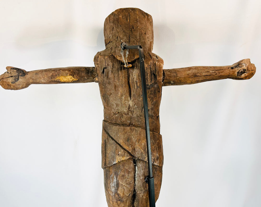 Colonial era devotional corpus figure with rustic carved details and patina