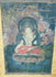 Hand-painted silk Buddhist artwork with haloed figure and decorative border