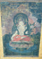 Hand-painted silk Buddhist artwork with haloed figure and decorative border